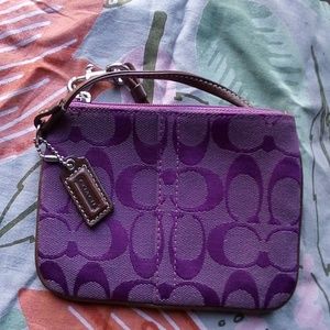 Plum Coach Wristlet